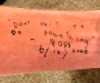 This photo provided by Sam Bennett shows a tattoo of the last words spoken to him by his father, who suffers from Alzheimer’s and also wrote the words down as best he could: 