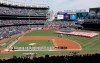 FILE - In this March 28, 2019, file photo, a large flag is unfurled during the national anthem before an opening day baseball game between the New York Yankees and the Baltimore Orioles at Yankee Stadium in New York. Forbes estimates the New York Yankees are baseball‚Äôs most valuable franchise at $5 billion, up 9% over last year and 47% more than the No. 2 Los Angeles Dodgers at $3.4 billion.(AP Photo/Seth Wenig, File)