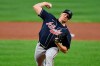 FILE - In this Tuesday, Sept. 15, 2020 file photo, Atlanta Braves reliever Mark Melancon delivers a pitch during the ninth inning of the team's baseball game against the Baltimore Orioles in Baltimore. Reliever Mark Melancon is guaranteed $3 million as part of his one-year contract with the San Diego Padres and could earn $11 million over two seasons if he closes regularly. (AP Photo/Terrance Williams, File)