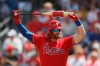 FILE - In this March 9, 2020, file photo, Philadelphia Phillies' Bryce Harper stretches during a spring training baseball game, in Clearwater, Fla. (AP Photo/Carlos Osorio, File)