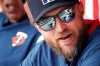 FILE - In this Monday, March 9, 2020, file photo, Minnesota Twins manager Rocco Baldelli speaks to players in the dugout before a spring training baseball game against the St. Louis Cardinals, in Fort Myers, Fla. (AP Photo/Elise Amendola, File)