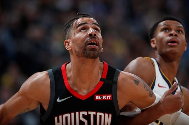 FILE - In a Sunday, Jan. 26, 2020 file photo, Houston Rockets forward Thabo Sefolosha (18), left, and Denver Nuggets guard PJ Dozier (35) in the second half of an NBA basketball game, in Denver. Time has not healed all wounds for Sefolosha, the NBA veteran who says he was attacked by a group of New York Police Department officers in April 2015 while they were arresting him outside a nightclub in the city’s Chelsea neighborhood. (AP Photo/David Zalubowski, File)