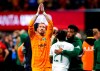 FILE - In this Dec. 8, 2018, file photo, Portland Timbers goalkeeper Jeff Attinella, center left, looks to the fans as midfielder Diego Chara (21) is consoled following their loss to Atlanta United FC in the MLS Cup championship soccer game in Atlanta. Attinella is also a children's book author, with five titles to his credit. He writes Dr. Seuss-style rhymes about his favorite sporting events, publishing them through his own company. He's now offering free downloads of the books while families are quarantining because of the coronavirus. (AP Photo/Todd Kirkland, File)
