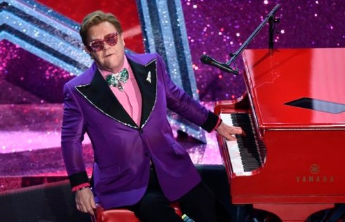FILE - In a Sunday, Feb. 9, 2020 file photo, Elton John performs 