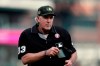 FILE - In this May 18, 2019, file photo, home plate umpire Mike Winters looks on during the eighth inning of a baseball game between the Detroit Tigers and the Oakland Athletics in Detroit. After more than three decades of hard work as a big league umpire, Winters is retiring. (AP Photo/Carlos Osorio, File)