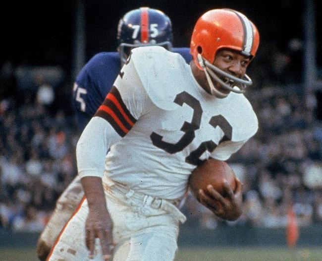 Jim Brown (32) was picked by the Browns with the No. 6 overall pick in 1957. Brown rushed for 12,312 yards in nine seasons, leading the league in eight seasons. (The Associated Press files)