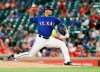 FILE - In this March 26, 2018, file photo, Texas Rangers relief pitcher Matt Bush throws in the sixth inning during a spring training baseball game against the Cincinnati Reds in Arlington, Texas. This comeback is much different for Bush, who has not pitched for the Rangers since 2018 because of two elbow operations. The reliever’s other comeback was part of a darker period that involved alcohol and a DUI accident that sent him to prison for nearly four years. (AP Photo/Brandon Wade, File)