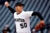 FILE - In this April 25, 2019, file photo, Pittsburgh Pirates starting pitcher Jameson Taillon delivers during the first inning of a baseball game against the Arizona Diamondbacks in Pittsburgh. A person familiar with the trade talks tells The Associated Press the New York Yankees made the second addition to their starting rotation of the offseason, agreeing to acquire right-hander Taillon from the Pirates for four prospects. (AP Photo/Gene J. Puskar, File)