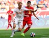 FILE - In this May 19, 2019, file photo, Atlanta United midfielder Jeff Larentowicz, left, keeps the ball away from New York Red Bulls forward Brian White during the first half of an MLS soccer match in Harrison, N.J. Larentowicz has retired after a 16-year career in Major League Soccer that included more than 400 appearances and championships in Colorado and Atlanta. (AP Photo/Steve Luciano, File)