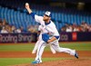 FILE - In this June 28, 2019, file photo, Toronto Blue Jays' David Phelps pitches against the Kansas City Royals during the sixth inning of a baseball game in Toronto. Free agent Phelps and the Milwaukee Brewers finalized a one-year contract on Thursday, Jan. 30, 2020, that guarantees $1.5 million and includes a club option for 2021. (Jon Blacker/The Canadian Press via AP, File)
