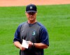 FILE - In this July 3, 2020, file photo, Seattle Mariners manager Scott Servais walks on the field at a 