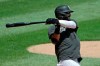 FILE - In this July 9, 2020, file photo, Chicago White Sox's Nomar Mazara hits during baseball practice at Guaranteed Rate Field in Chicago. Mazara and the Detroit Tigers finalized a $1.75 million, one-year contract on Friday, Feb. 12, 2021. (AP Photo/Nam Y. Huh, File)