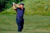 FILE - In this Aug. 20, 2020, file photo, Phil Mickelson hits from the rough on the 14th fairway in the first round of the Northern Trust golf tournament at TPC Boston in Norton, Mass. Mickelson will begin his preparation for the Masters in earnest on Friday, Oct. 16, 2020, at a place, and on a tour, not typically associated with the regimen required to win a major. The lefthander is making his second start on the PGA Tour Champions in the Dominion Energy Charity Classic at the Country Club of Virginia's somewhat forgiving James River course. (AP Photo/Charles Krupa, File)
