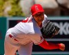 FILE - In this Aug. 2, 2020, file photo, Los Angeles Angels pitcher Shohei Ohtani, of Japan, throws during the second inning of a baseball game against the Houston Astros in Anaheim, Calif. Ohtani agreed to a two-year, $8.5 million contract with the Angels on Monday, Feb. 8, 2021, avoiding arbitration. (AP Photo/Mark J. Terrill, File)