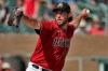 FILE - In this Feb. 27, 2020, file photo, Arizona Diamondbacks pitcher Madison Bumgarner throws during the second inning of spring training baseball game against the Cincinnati Reds in Scottsdale Ariz. Arizona's new pitching addition Bumgarner threw two innings of live batting practice on Saturday, July 4, 2020. It was his first outing during the team's summer camp at Chase Field as the D-backs prepare for a 60-game season. (AP Photo/Matt York, File)