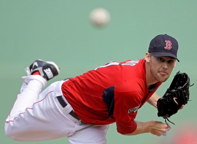 FILE - In this March 6, 2012, file photo, Boston Red Sox pitcher Daniel Bard throws during the first inning of a spring training baseball game against the Baltimore Orioles in Fort Myers, Fla. The Colorado Rockies have jettisoned veteran relievers Jake McGee and Bryan Shaw to make way for an infusion of youth in their bullpen. The Rockies also let several veterans know they had made the team. Among them is reliever Bard. He is a former first-round pick of the Red Sox who has not pitched in the major leagues since 2013. (AP Photo/David Goldman, File)