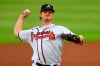 FILE - In this July 29, 2020, file photo, Atlanta Braves' Mike Soroka throws a pitch during the second inning of the baseball team's home-opener, against the Tampa Bay Rays in Atlanta. St. Louis pitcher Jack Flaherty and Soroka won their salary arbitration cases on Saturday, Feb. 13, 2021, and Tampa Bay reliever Ryan Yarbrough lost. (AP Photo/John Amis, File)