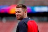 FILE - In this Oct. 5, 2019, file photo, Atlanta Braves' Freddie Freeman looks over his shoulder as he enters the batting cage during a baseball workout in St. Louis. Freeman does not know if he has time to be ready for the Braves' opener at the New York Mets. Following a scary journey in his battle with COVID-19, Freeman knows he is grateful to even have a chance. (AP Photo/Jeff Roberson, File)