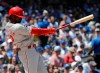FILE - In this May 23, 2019, file photo, Philadelphia Phillies' Andrew McCutchen hits a double against the Chicago Cubs during the first inning of a baseball game in Chicago. McCutchen says he plans to be ready for opening day after a knee injury cut short his 2019 season. (AP Photo/Nam Y. Huh, File)