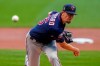 FILE - In this Aug. 11, 2020, file photo, Minnesota Twins' Tyler Clippard throws during the first inning of a baseball game against the Milwaukee Brewers in Milwaukee. The Arizona Diamondbacks have agreed to a $2.25 million, one-year contract with Clippard, a person with knowledge of the negotiations told The Associated Press. The agreement was reached on Monday, Feb. 22, 2021, and confirmed to the AP on condition of anonymity because the deal is pending a physical. (AP Photo/Morry Gash, File)