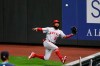 FILE - In this Aug. 5, 2020, file photo, Los Angeles Angels right fielder Jo Adell tries to catch a deep fly ball from Seattle Mariners' Evan White during the seventh inning of a baseball game in Seattle. Angels manager Joe Maddon will not be surprised if Adell starts the upcoming season in the minors after a rough 38-game introduction to the big leagues in 2020. (AP Photo/Elaine Thompson, File)