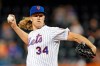 FILE - In this Sept. 24, 2019, file photo, New York Mets starting pitcher Noah Syndergaard winds up during the first inning of the team's baseball game against the Miami Marlins in New York. Right-hander Syndergaard has agreed to a $9.7 million, one-year deal with the Mets to avoid salary arbitration. (AP Photo/Kathy Willens, File)