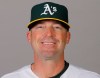FILE - In this Feb. 20, 2020, file photo, Ryan Christenson, of the Oakland Athletics baseball team, poses for a photo in Mesa, Ariz. Major League Baseball has been in touch with the Athletics about bench coach Christenson making a gesture that appeared to be a Nazi salute following a win over the Texas Rangers. There has been no discipline announced against Christenson. He has apologized for raising his arm during a postgame celebration Thursday, Aug. 6, 2020. The team is giving him the benefit of the doubt that he intended no harm. (AP Photo/Darron Cummings, File)