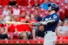 FILE - In this Sept. 25, 2019, file photo, Milwaukee Brewers' Ryan Braun watches his grand slam off Cincinnati Reds starting pitcher Tyler Mahle during the first inning of a baseball game in Cincinnati. Braun says he i “strongly leaning” toward retirement, but the Brewers’ home-run leader is not ready to make any decision regarding his future just yet. (AP Photo/John Minchillo, File)