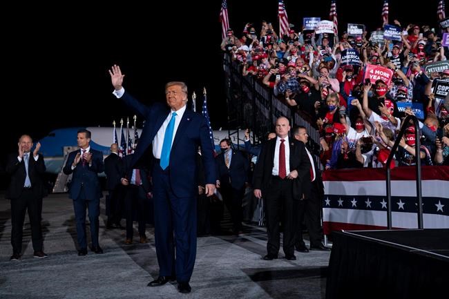 President Donald Trump arrives for a campaign rally at Harrisburg International Airport, Saturday, Sept. 26, 2020, in Middletown, Pa. (AP Photo/Evan Vucci)