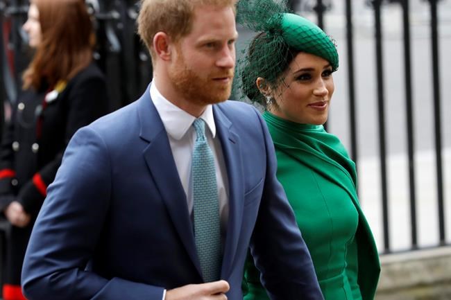 FILE - In this March 9, 2020, file photo, Britain's Harry and Meghan the Duke and Duchess of Sussex arrive to attend the annual Commonwealth Day service at Westminster Abbey in London. Almost as soon as Meghan and Prince Harry's interview with Oprah Winfrey aired, many were quick to deny Meghan’s allegations of racism on social media. Many say it was painful to watch Meghan’s experiences with racism invalidated by the royal family, members of the media and the public, offering up yet another example of a Black woman’s experience being disregarded and denied. (AP Photo/Kirsty Wigglesworth, File)