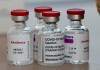 FILE - In this Feb. 5, 2021, file photo, vials AstraZeneca vaccine ready to be used at the Wellcome Centre in London. In recent days, countries including Denmark, Ireland and Thailand have temporarily suspended their use of AstraZeneca's coronavirus vaccine after reports that some people who got a dose developed blood clots, even though there's no evidence that the shot was responsible. The European Medicines Agency and the World Health Organization say the data available do not suggest the vaccine caused the clots. Britain and several other countries have stuck with the vaccine. (AP Photo/Frank Augstein, File)