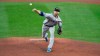 New York Mets starting pitcher Jacob deGrom throws to a Toronto Blue Jays batter during the first inning of a baseball game in Buffalo, N.Y., Friday, Sept. 11, 2020. deGrom is wearing a New York Police Department cap in honor of the 19th anniversary of the Sept. 11, 2001, terror attacks. (AP Photo/Adrian Kraus)