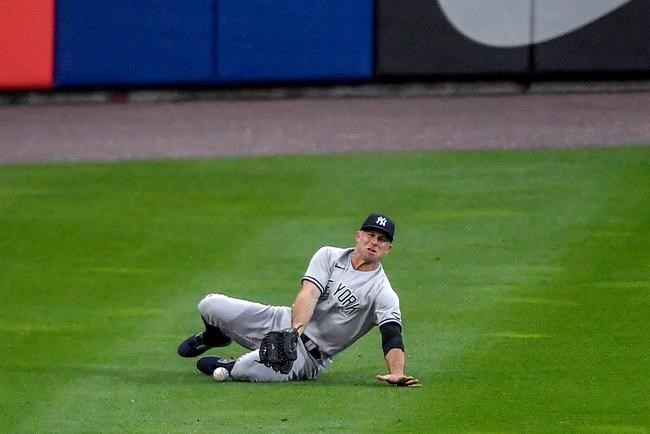 New York Yankees left fielder Brett Gardner fields a double by Toronto Blue Jays' Cavan Biggio during the first inning of a baseball game in Buffalo, N.Y., Monday, Sept. 7, 2020. (AP Photo/Adrian Kraus)