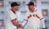 Colorado Rockies outfielder Larry Walker, left, and New York Yankees shortstop Derek Jeter shake hands after receiving their Baseball Hall of Fame jersey and cap, Wednesday Jan. 22, 2020, during a news conference in New York. (AP Photo/Bebeto Matthews)