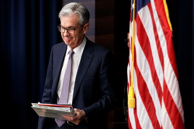 FILE - In this Dec. 11, 2019, file photo Federal Reserve Chair Jerome Powell arrives to speak at a news conference after the Federal Open Market Committee meeting in Washington. On Thursday, Jan. 2, 2020, the Federal Reserve releases minutes from its December meeting when it kept its key interest rate unchanged. (AP Photo/Jacquelyn Martin, File)