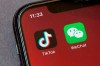 FILE - A federal judge has approved a request from a group of WeChat users to delay looming U.S. government restrictions that could effectively make the popular app nearly impossible to use. In a ruling dated Saturday, Sept. 19, 2020, Magistrate Judge Laurel Beeler in California said the government’s actions would affect users’ First Amendment rights as an effective ban on the app removes their platform for communication. (AP Photo/Mark Schiefelbein, File)