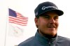 Sami Valimaki, of Finland, smiles as he waits outside the clubhouse before practicing for the U.S. Open Championship golf tournament, Tuesday, Sept. 15, 2020, at the Winged Foot Golf Club in Mamaroneck, N.Y. (AP Photo/Charles Krupa)
