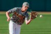 FILE - In this March 16, 2019, file photo, Baylor sophomore shortstop Nick Loftin fields a grounder during the team's NCAA college baseball game against Cal Poly in Waco, Texas. The Kansas City Royals selected Loftin in the draft Wednesday, June 10, 2020. (AP Photo/Brandon Wade, File)