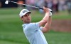 FILE - In this March 8, 2020, file photo, Harris English watches after hitting from the first fairway during the final round of the Arnold Palmer Invitational golf tournament in Orlando, Fla. The PGA Tour said players exempt for this season will keep the same status for the 2020-21 season that is scheduled to start in September unless they earn a higher ranking after this shortened season. That could help someone like English, who started the season with conditional status from finishing between Nos. 126 and 150 the previous season. He has posted five top 10s and is No. 24 in the FedEx Cup, making his a lock to have a full card for next season. (AP Photo/Phelan M. Ebenhack, File)