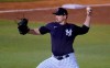 FILE - In this March 19, 2021, file photo, New York Yankees pitcher Justin Wilson delivers during the team's spring training baseball game against the Philadelphia Phillies in Tampa, Fla. Wilson became the Yankees' second left-handed reliever to get hurt during spring training, leaving Monday night's exhibition against Philadelphia due to tightness in his pitching shoulder. New York said Wilson will have an MRI on Tuesday. (AP Photo/Gene J. Puskar, File)