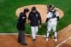 FILE - In this April 12, 2021, file photo, Chicago White Sox manager Tony La Russa, center, argues with home plate umpire Gabe Morales (47) while catcher Yasmani Grandal (24) listens during the ninth inning of the team's baseball against the Cleveland Indians in Chicago. La Russa developed a reputation as a master strategist while managing the Oakland Athletics to a World Series championship and the St. Louis Cardinals to two more. His second tenure with the Chicago White Sox is off to a bumpy start. (AP Photo/Paul Beaty, File)