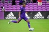 FILE - In this Nov. 21, 2020, file photo, Orlando City midfielder AndrÃ©s Perea makes a penalty kick during overtime of an MLS soccer playoff match against New York City FC in Orlando, Fla. Perea is among several dual nationals at American training camp this week ahead of a Dec. 9 exhibition against El Salvador in Fort Lauderdale, Fla. U.S. coach Gregg Berhalter will try to persuade them to commit to the U.S. program. (AP Photo/Phelan M. Ebenhack, File)