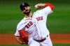 FILE - In this Sept. 18, 2020, file photo, Boston Red Sox's Martin Pérez pitches during the first inning of the team's baseball game against the New York Yankees in Boston. Pérez and the Red Sox finalized a $5 million, one-year contract Friday, Feb. 12, 2021. Pérez gets a $4.5 million salary, and Boston holds a $6 million team option for 2022 with a $500,000 buyout. (AP Photo/Michael Dwyer, File)