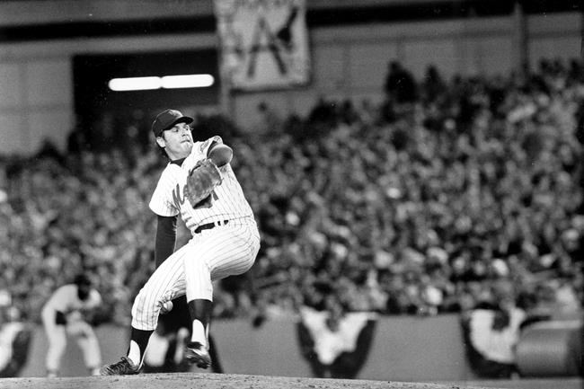 FILE - In this Oct. 16, 1973, file photo, New York Mets pitcher Tom Seaver winds up during first inning of Game 3 of the World Series against the Oakland Athletics at Shea Stadium in New York. Seaver, the galvanizing leader of the Miracle Mets 1969 championship team and a pitcher who personified the rise of expansion teams during an era of radical change for baseball, has died. He was 75. The Hall of Fame said Wednesday night, Sept. 2, 2020, that Seaver died Aug. 31 from complications of Lewy body dementia and COVID-19. (AP Photo, File)