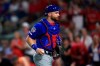 FILE - In this Aug. 10, 2019, file photo, Chicago Cubs' Jonathan Lucroy holds the ball during the team's baseball game against the Cincinnati Reds in Cincinnati. The White Sox agreed to a minor league contract with Lucroy, giving them another option behind Yasmani Grandal. A person familiar with the situation confirmed Chicago's deal Thursday, Feb. 4, 2021, on condition of anonymity because the move was pending a physical. The 34-year-old Lucroy appeared in one game with Boston last season. (AP Photo/Aaron Doster, File)