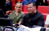 FILE - In this Dec. 13, 2019, file photo, Jennifer Lopez, left, and Alex Rodriguez sit courtside during an NBA basketball game between the Miami Heat and the Los Angeles Lakers in Miami. Rodriguez and Lopez have retained J.P. Morgan to represent them in raising capital for a possible bid for the New York Mets. The move was first reported by Variety and confirmed to The Associated Press by a person familiar with the decision who spoke on condition of anonymity because it was not announced. (AP Photo/Lynne Sladky, File)