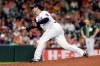 FILE - In this Sept. 12, 2019, file photo, Houston Astros relief pitcher Joe Smith throws to an Oakland Athletics batter during a baseball game in Houston. Manager Dusty Baker doesn’t expect Smith to play for the Astros this season. Smith has not reported to camp because of what general manager James Click called concerns for the safety of his family. Smith was placed on the restricted list Tuesday night, July 15, but he has not said publicly if he is opting out of the season, which starts for the Astros on July 24. (AP Photo/Michael Wyke, File)