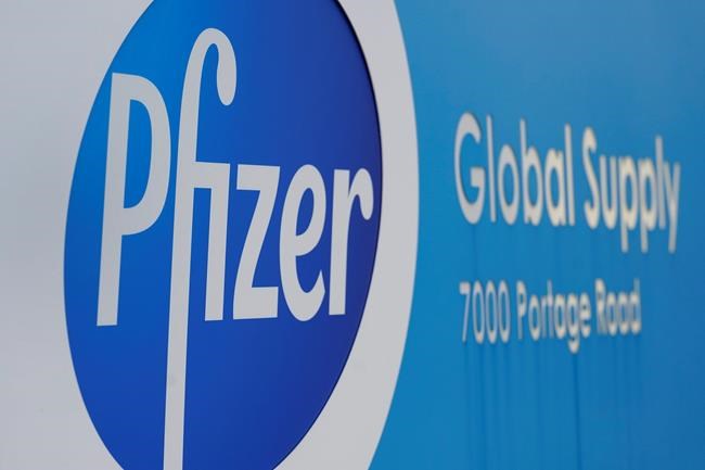 FILE - In this Friday, Dec. 11, 2020, file photo, a Pfizer Global Supply Kalamazoo manufacturing plant sign is shown in Portage, Mich. New research suggests that Pfizer’s COVID-19 vaccine can protect against a mutation found in two contagious variants of the coronavirus that erupted in Britain and South Africa. Those variants are causing global concern. They both share a common mutation called N501Y, a slight alteration on one spot of the spike protein that coats the virus and is believed to be the reason they can spread so easily. (AP Photo/Paul Sancya, File)
