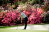 FILE - In this April 8, 2019, file photo, Rory McIlroy, of Northern Ireland, watches his putt on the 13th hole during a practice round for the Masters golf tournament in Augusta, Ga. Because of the coronavirus pandemic, the Masters is being held in November (Nov. 12-15) for the first time. (AP Photo/Charlie Riedel, File)