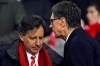 FILE - In this Jan. 25, 2012, file photo, Liverpool owners John Henry, right, and Tom Werner speak before their side's English League Cup semifinal second leg soccer match against Manchester City at Anfield Stadium in Liverpool, England. Liverpool won its first league title since 1990, clinching Thursday, June, 25, 2020. Because of the pandemic, Henry and Werner, who headed the group that bought the team in 2010, watched on television from the U.S. (AP Photo/Tim Hales, File)